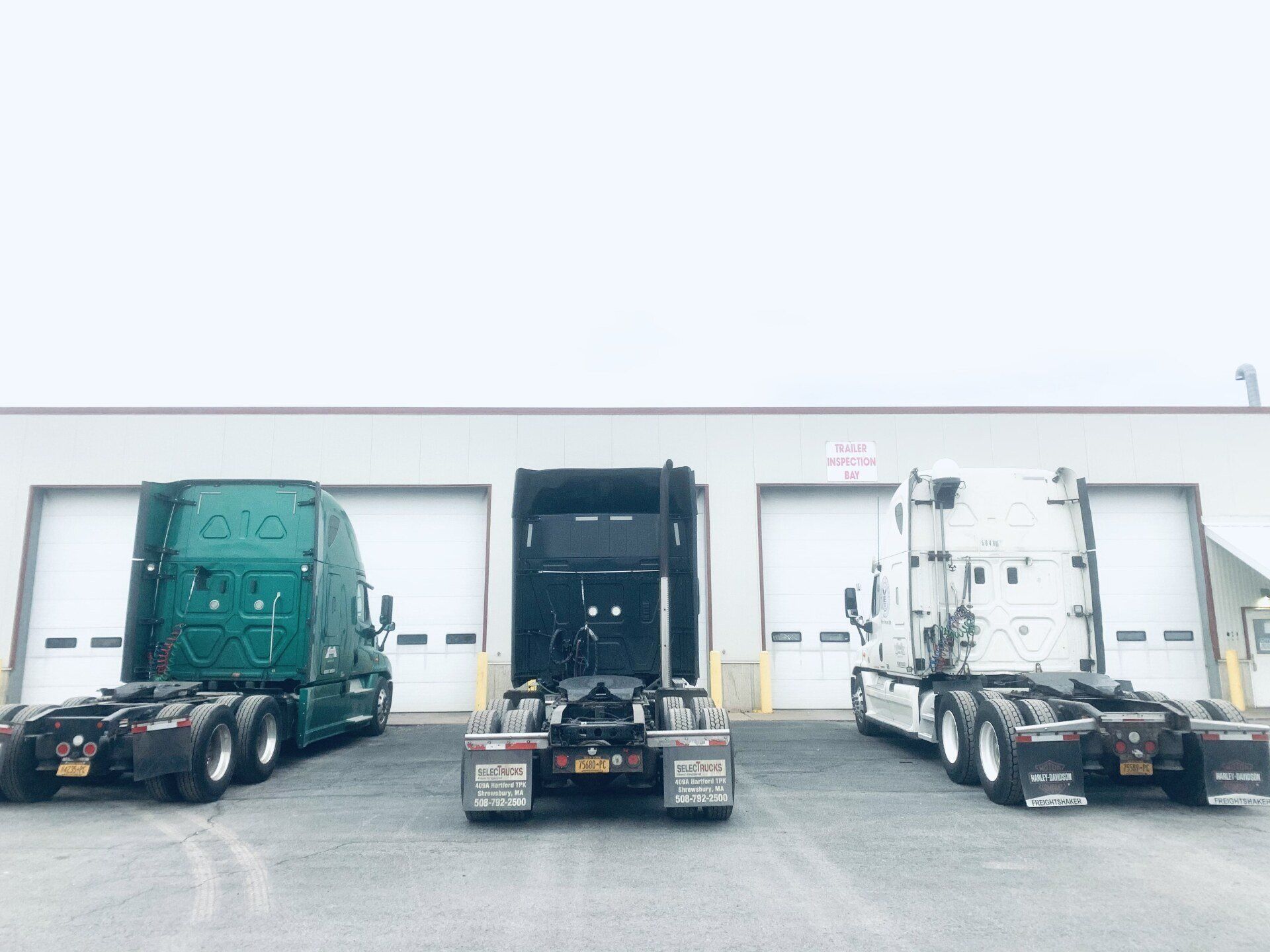 Trucks in Parking Lot — Rome, NY — R.B. Humphreys, Inc.