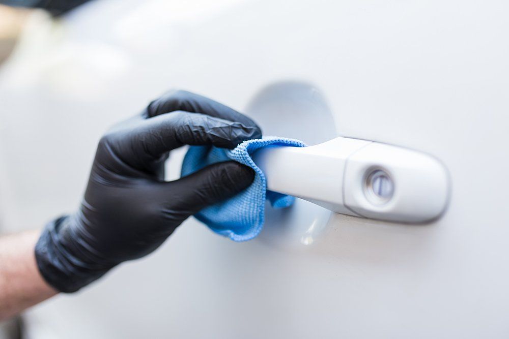 Cleaning Car Door Handle — Oklahoma City, OK — Super Clean Full Service Car Wash And Detail Shop