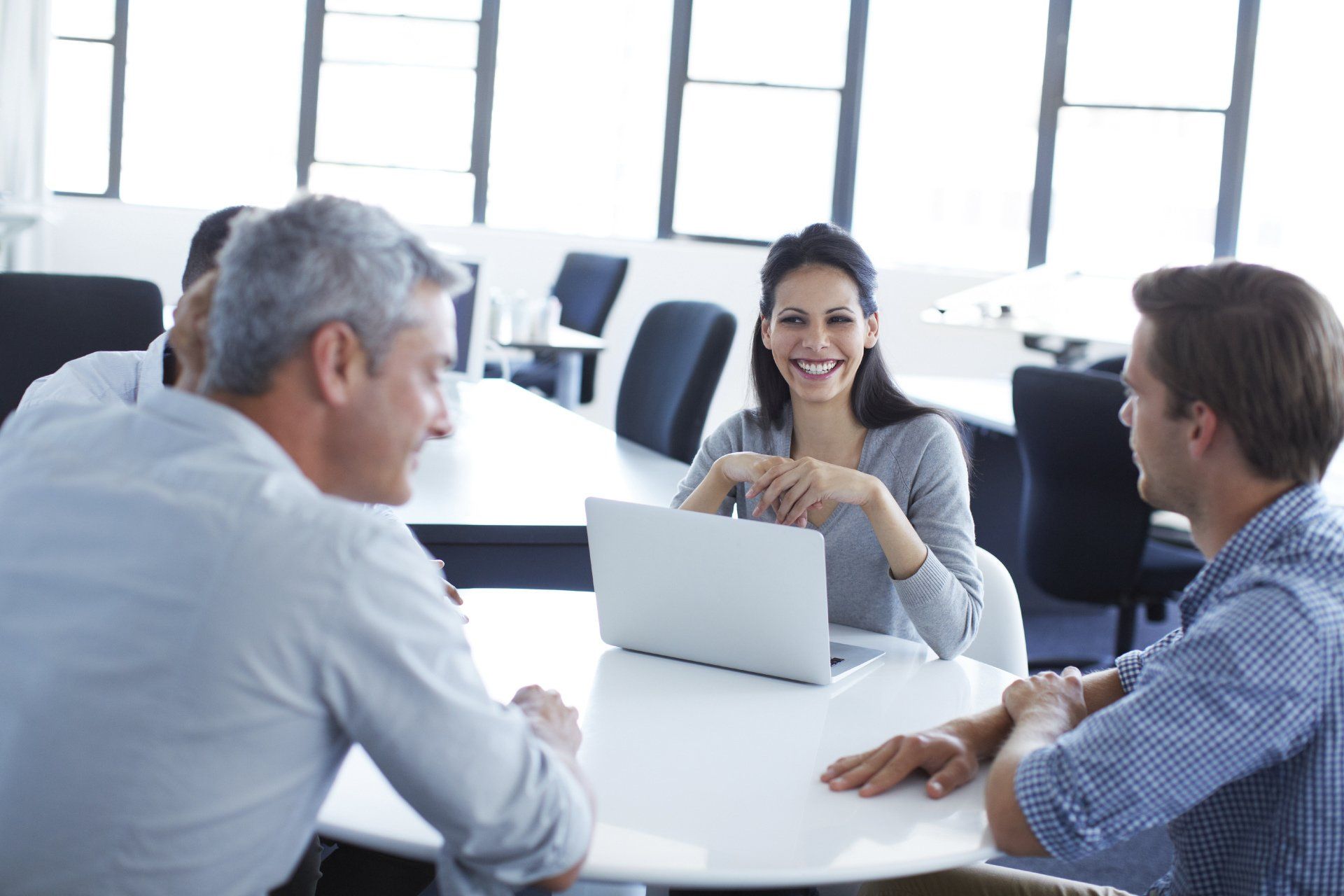 Business people in a meeting and laughing