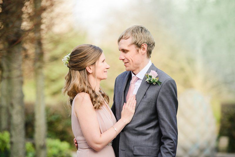 bride and groom celebrating wedding with bridal hair and makeup by Jax-Glam Beauty Bristol