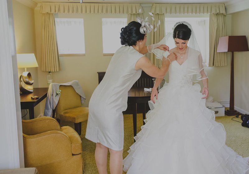 mother of the bride helping bride get ready with hair and makeup by Jax-Glam Beauty Bristol