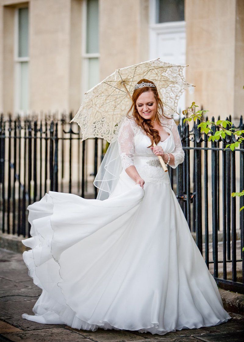 bride walking outside wedding venue with bridal hair and makeup by Jax-Glam Beauty Bristol