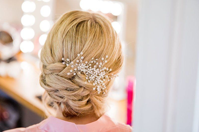 bridal hair updo with crystal hair accessory by Jax-Glam Beauty wedding hair stylist Bristol