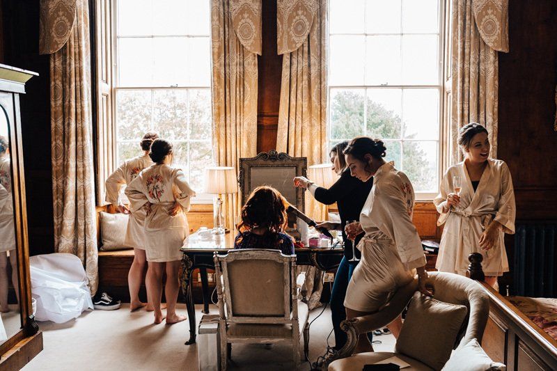 bride getting ready with bridesmaids hair and makeup by Jax-Glam Beauty Bristol