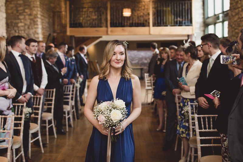 bride walking down aisle with bridal hair and makeup by Jax-Glam Beauty Bristol