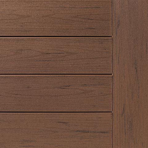 Brown composite deck planks with wood grain texture.
