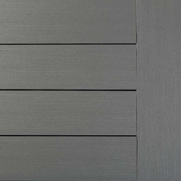 Gray composite siding with horizontal planks and vertical panel.