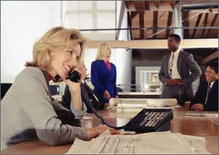 Job Placement — Woman in Office Talking on Phone in Garland, TX