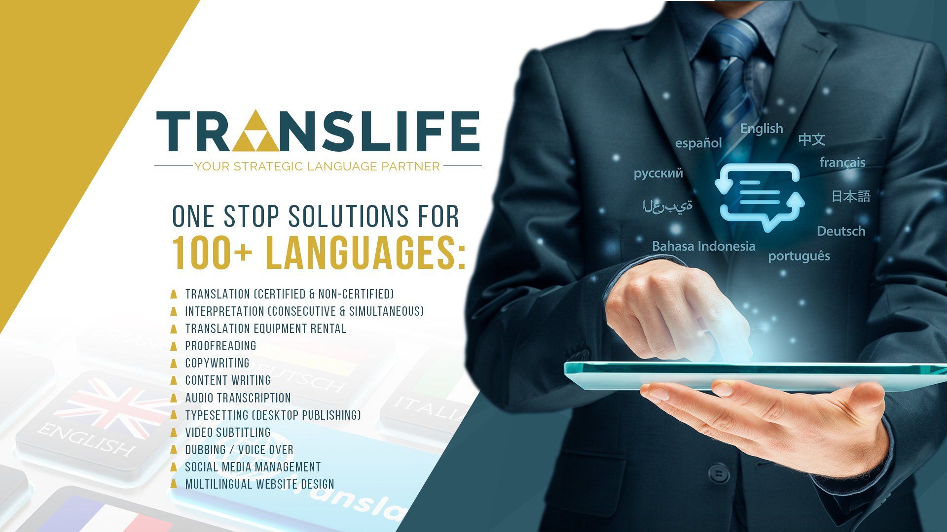 A man in a suit and tie is holding a tablet in his hand.