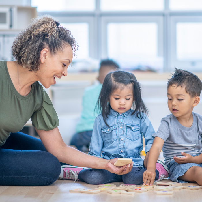 Daycare instructor with students