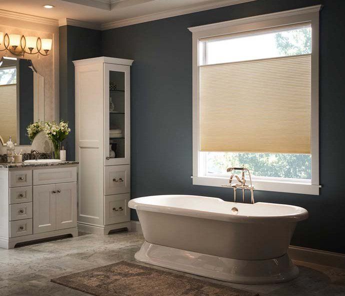 blinds next to bathtub