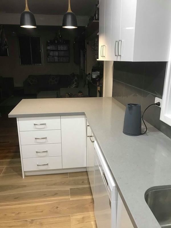 Kitchen with elegant black pendant lights — DMB Kitchens in Port Macquarie, NSW