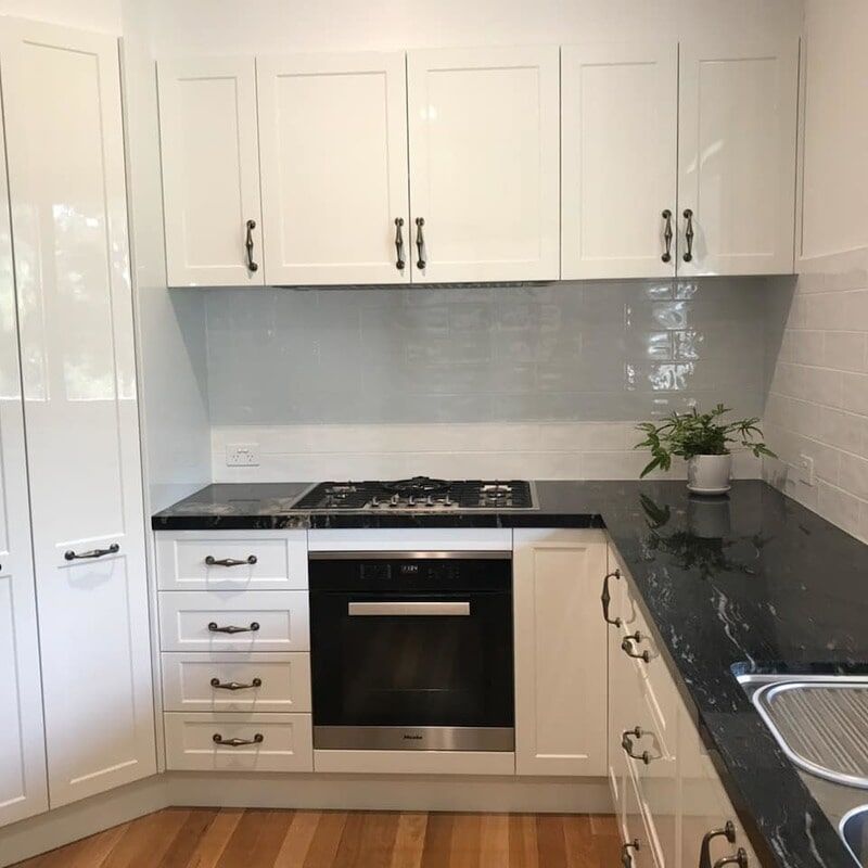 kitchen with white wood paneling — DMB Kitchens in Port Macquarie, NSW