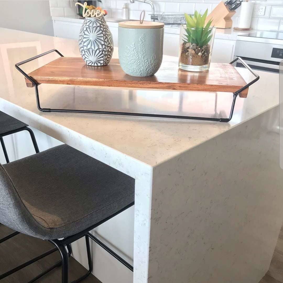 Small Plants On A Marble Table — DMB Kitchens in Port Macquarie, NSW
