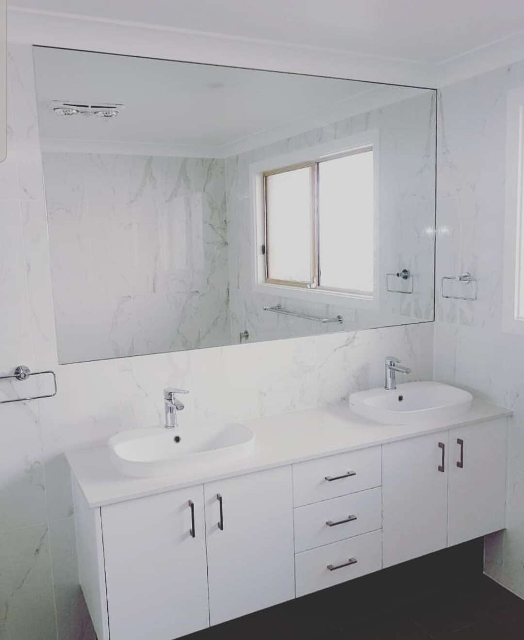 Two White Bathroom Sinks And A Bathroom Mirror — DMB Kitchens in Port Macquarie, NSW