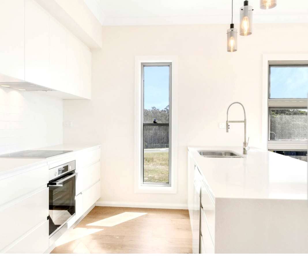 White Sink And Microwave Oven — DMB Kitchens in Port Macquarie, NSW