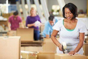 woman packing boxes