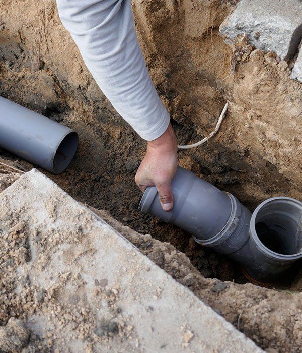 Laying & Installing Sewer Pipe — Ian Stanley Plumbing In Avoca, QLD