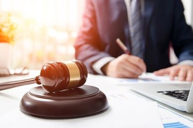 Attorney Writing A Document — Accident Attorneys in Komono, IN Attorney Writing A Document — Accident Attorneys in Komono, IN