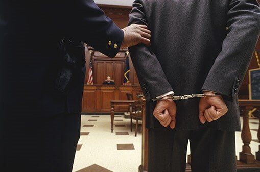 Man in the Handcuff — Vehicular Accident Attorneys in Komono, IN Man in the Handcuff — Vehicular Accident Attorneys in Komono, IN