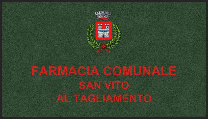 Sign for Farmacia Comunale in San Vito al Tagliamento on a dark green background with red text