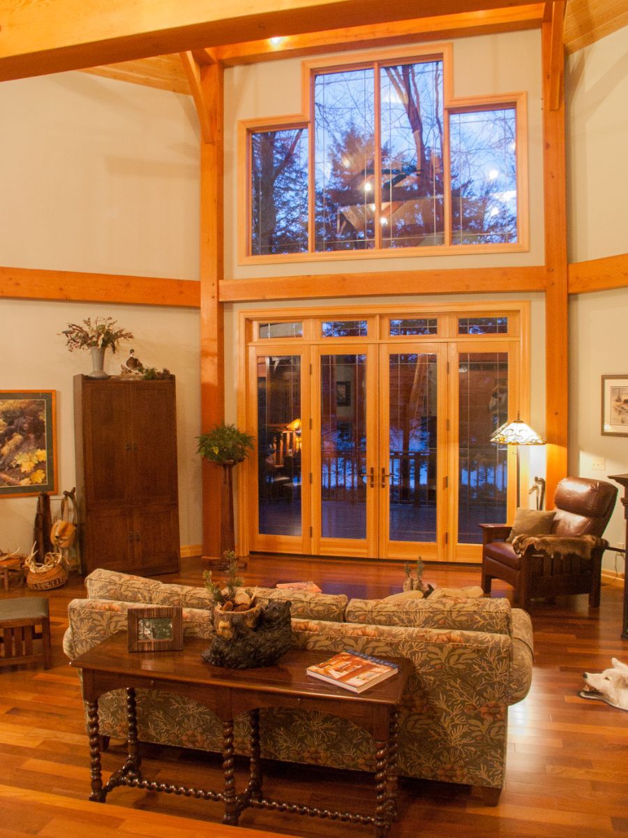 Custom Muskoka Cottage featuring a living room with a couch and a table