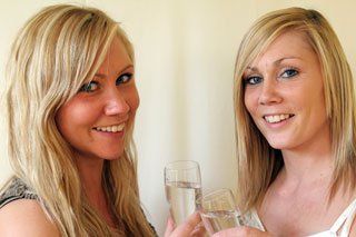 Two women celebrating civil union agreement