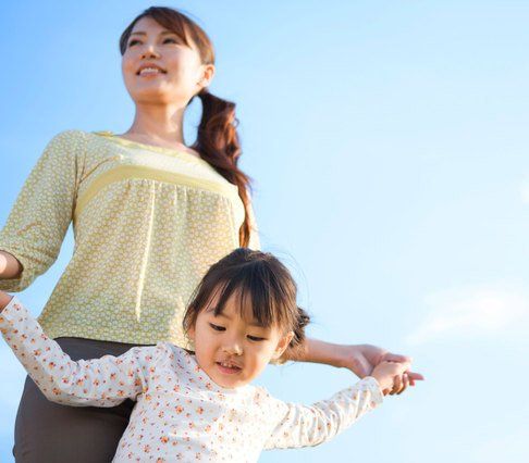 Mother and daughter playing