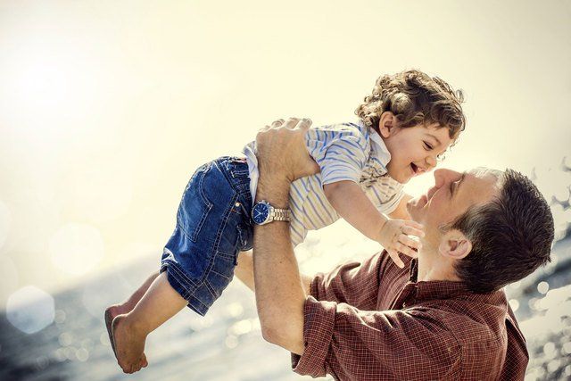Father holding his child