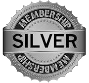Silver membership badge. Circular design with