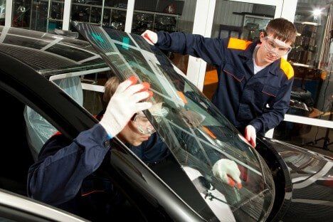 Two Men Installing Car Glass — Auto Glass Replacement in Marion, NC