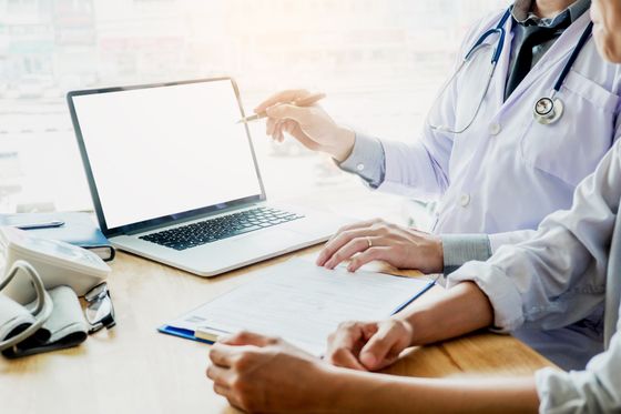 IT Support — Doctor and Man with Laptop in Dallas, TX IT Support — Doctor and Man with Laptop in Dallas, TX