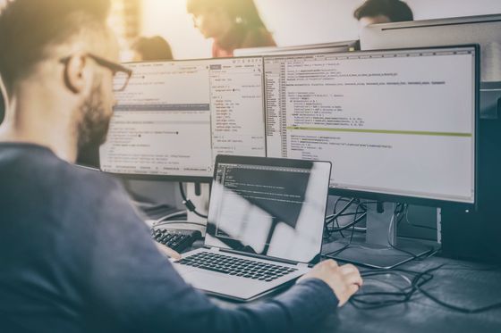 Computer Support — Man Working with Codes in Dallas, TX Computer Support — Man Working with Codes in Dallas, TX