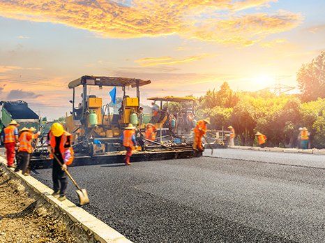 Laying New Asphalt Road Pavement — Waynesboro, VA — Josh's Paving Inc. Laying New Asphalt Road Pavement — Waynesboro, VA — Josh's Paving Inc.
