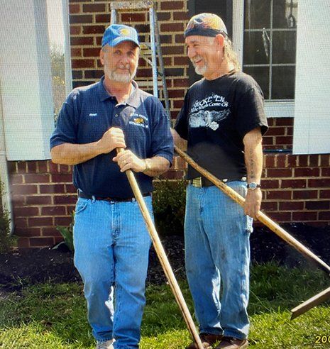 Men with Squeegee — Waynesboro, VA — Josh's Paving Inc. Men with Squeegee — Waynesboro, VA — Josh's Paving Inc.
