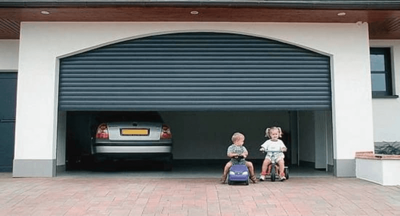 half closed garage shutter and with kids playing around