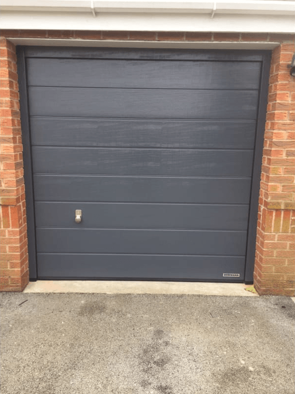 A garage shutter in grey colour