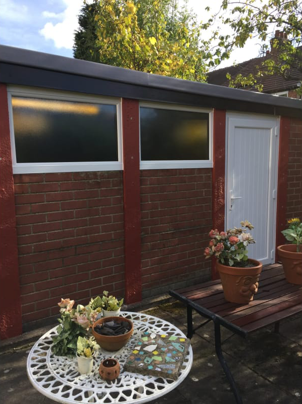 an extension with a white wooden door