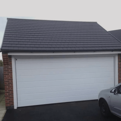 Garage door in shutter in white colour