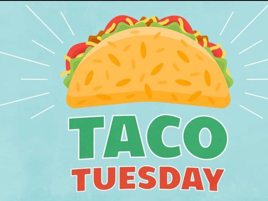A taco tuesday sign with a taco on it