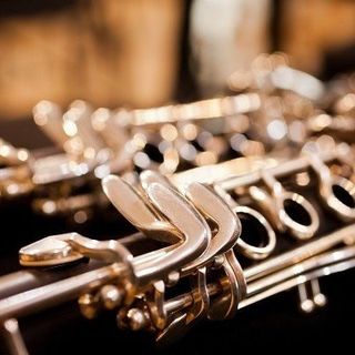 a music instrument with a note of lyrics on the background