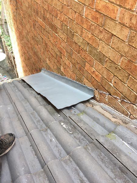 Roof repair work in progress