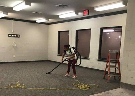 Cleaning Service Company — Worker Cleaning the Office in Prairieville, LA Cleaning Service Company — Worker Cleaning the Office in Prairieville, LA