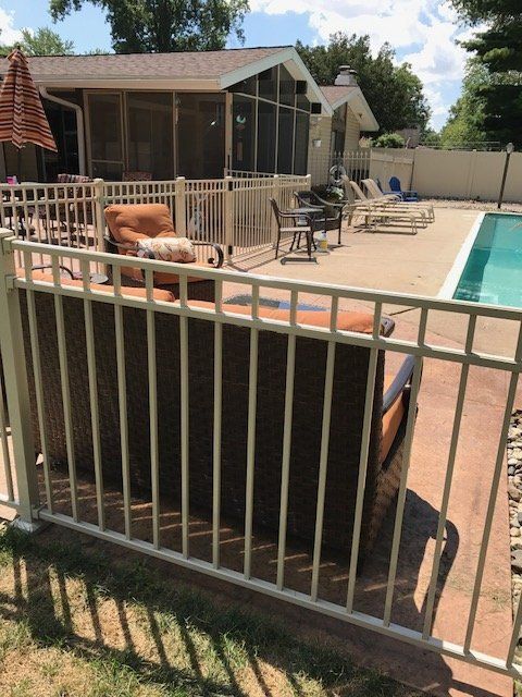 Pool With Iron Fence — Fort Wayne, IN — Arrow Fence