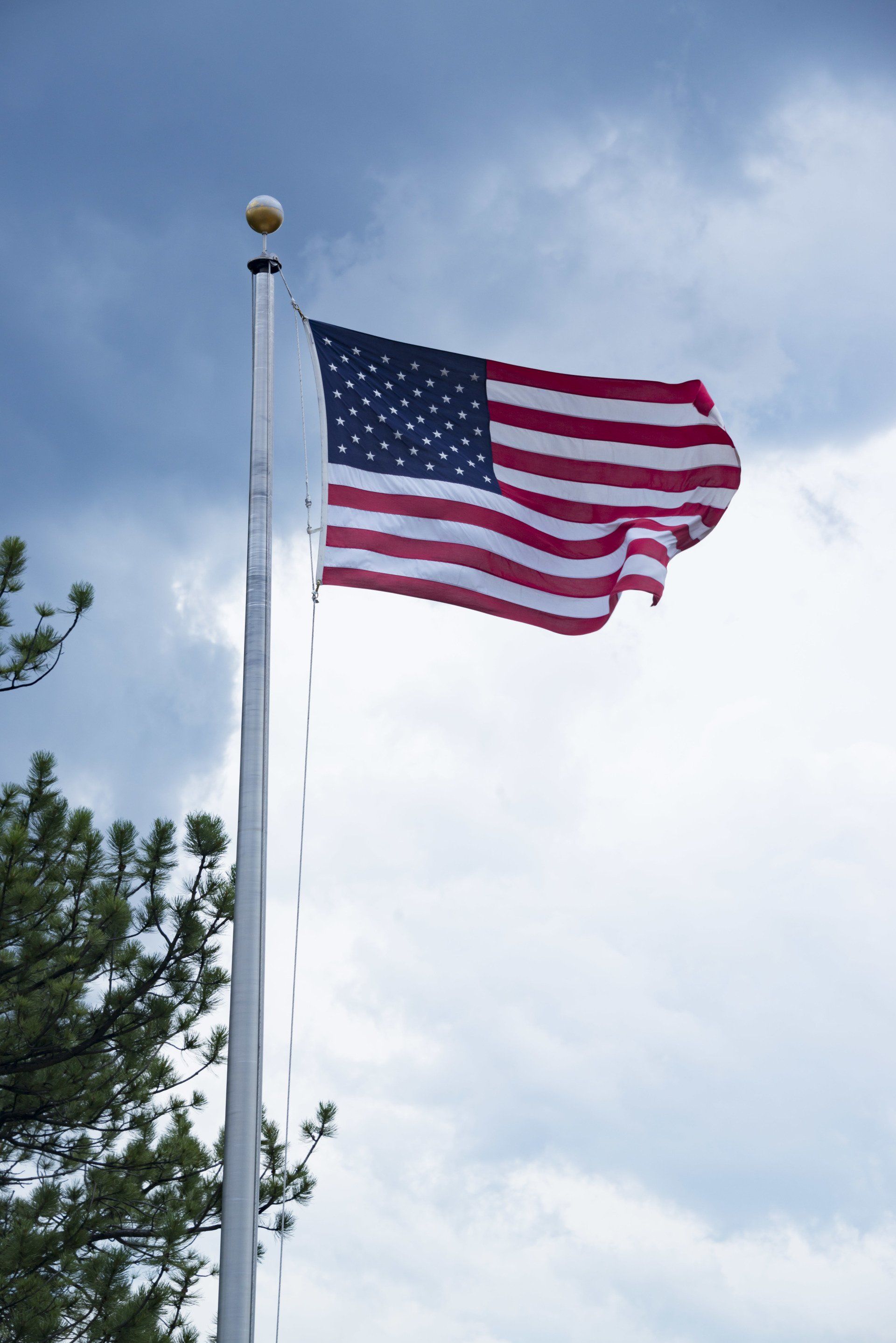 Flag Pole with American Flag — Fort Wayne, IN — Arrow Fence