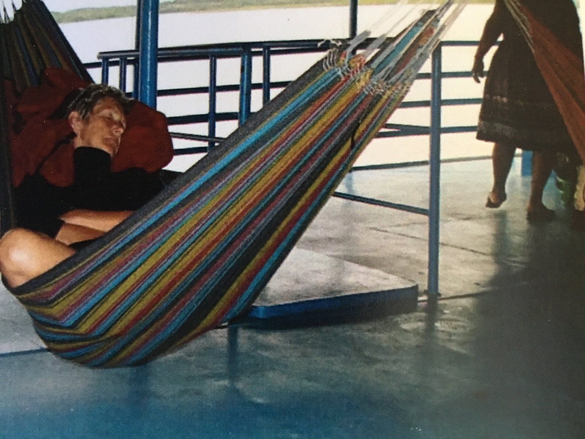 carolyn wasik sleeping in a hammock on a barge going up the amazon