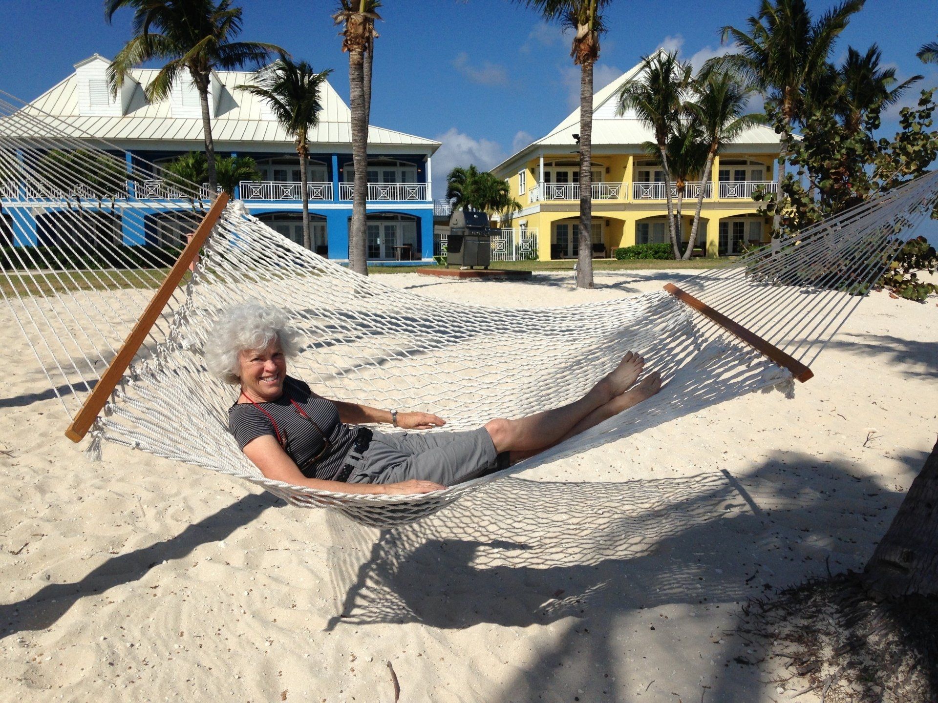 author janet howle in a hammock on a beach