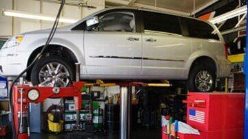 Lift In Shop — Automotive Repairs in Denville, NJ Lift In Shop — Automotive Repairs in Denville, NJ