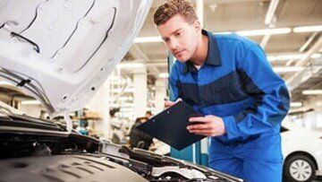 Concentrated On Work — Automotive Repairs in Denville, NJ Concentrated On Work — Automotive Repairs in Denville, NJ