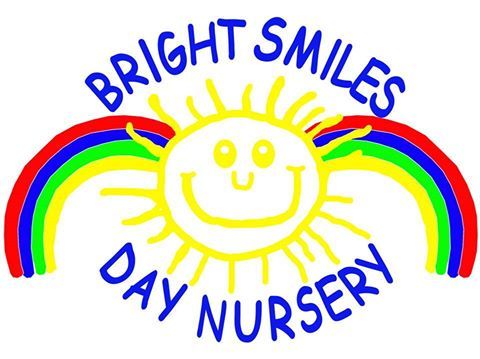Bright smiles day nursery logo with a smiling sun and rainbows